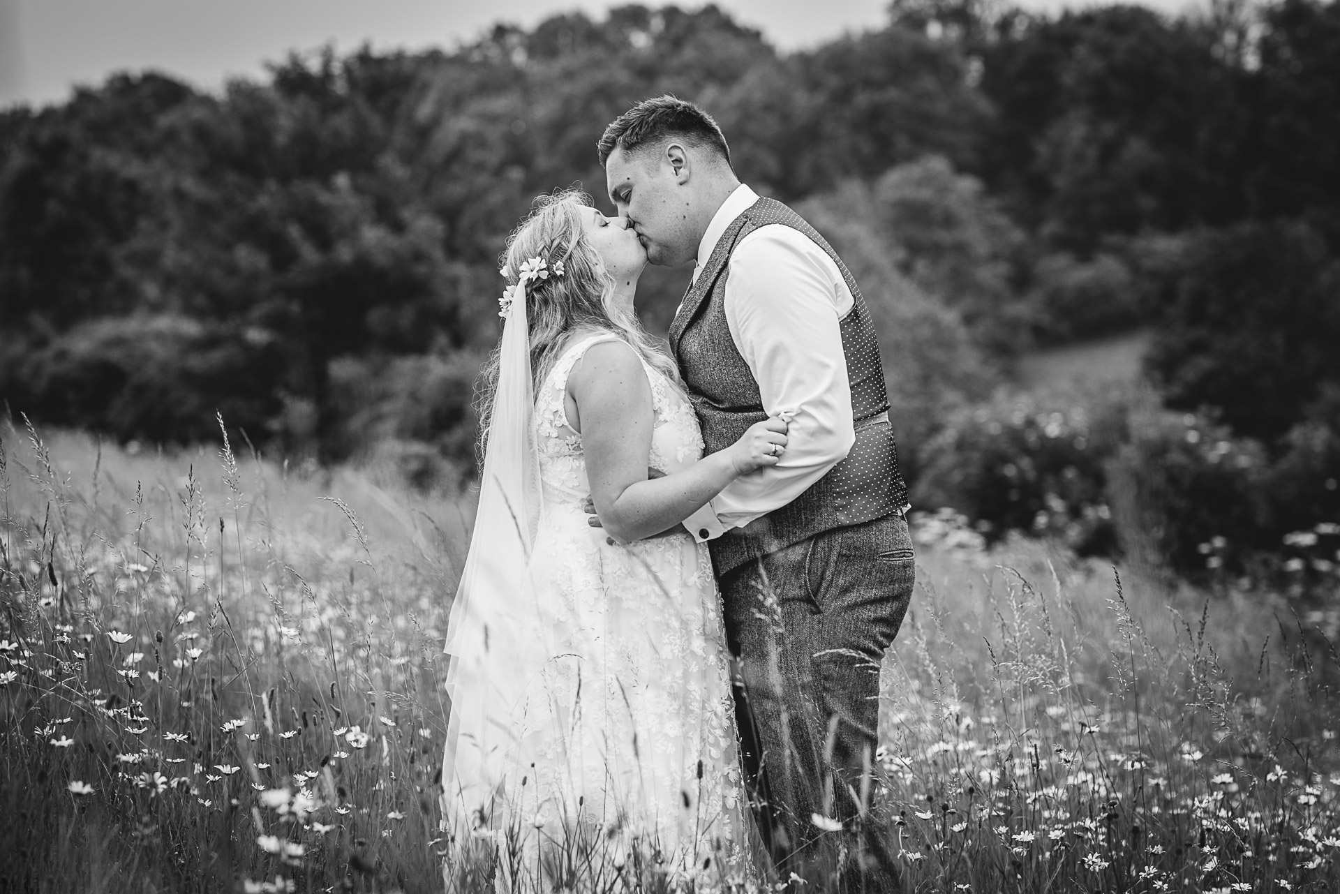Bride and groom Portrait in the fields at Ashton Farm Barn