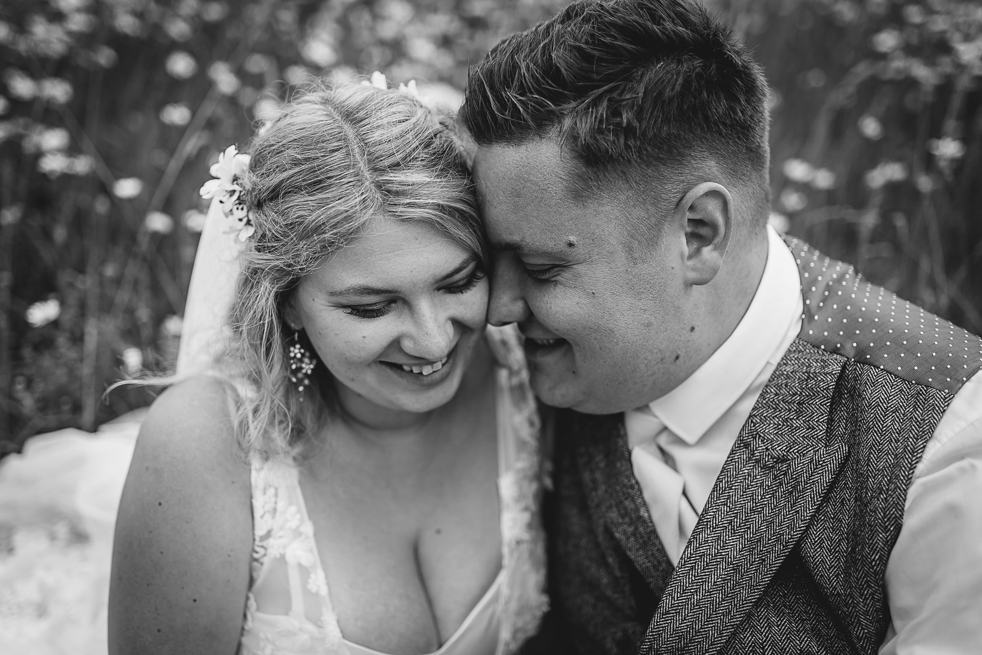 Black & White Portrait of Bride and Groom in a field