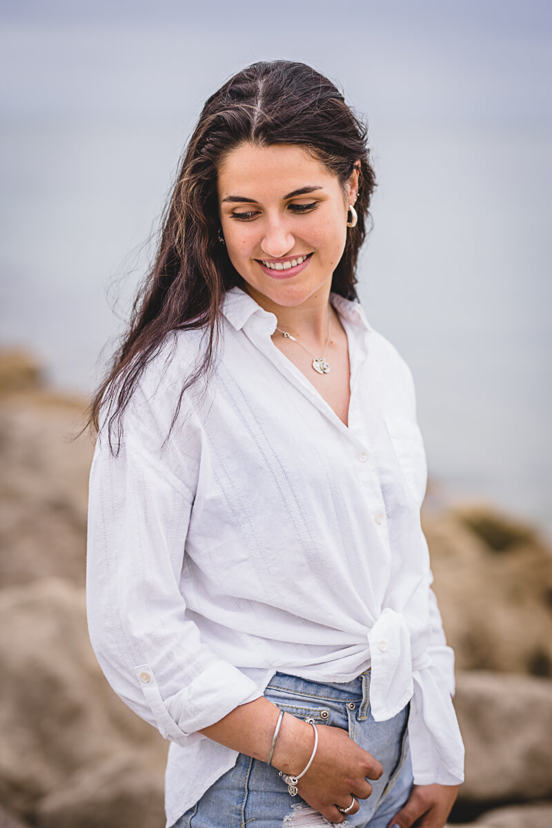 Photograph of a young woman on a portrait shoot at Sandbanks beach